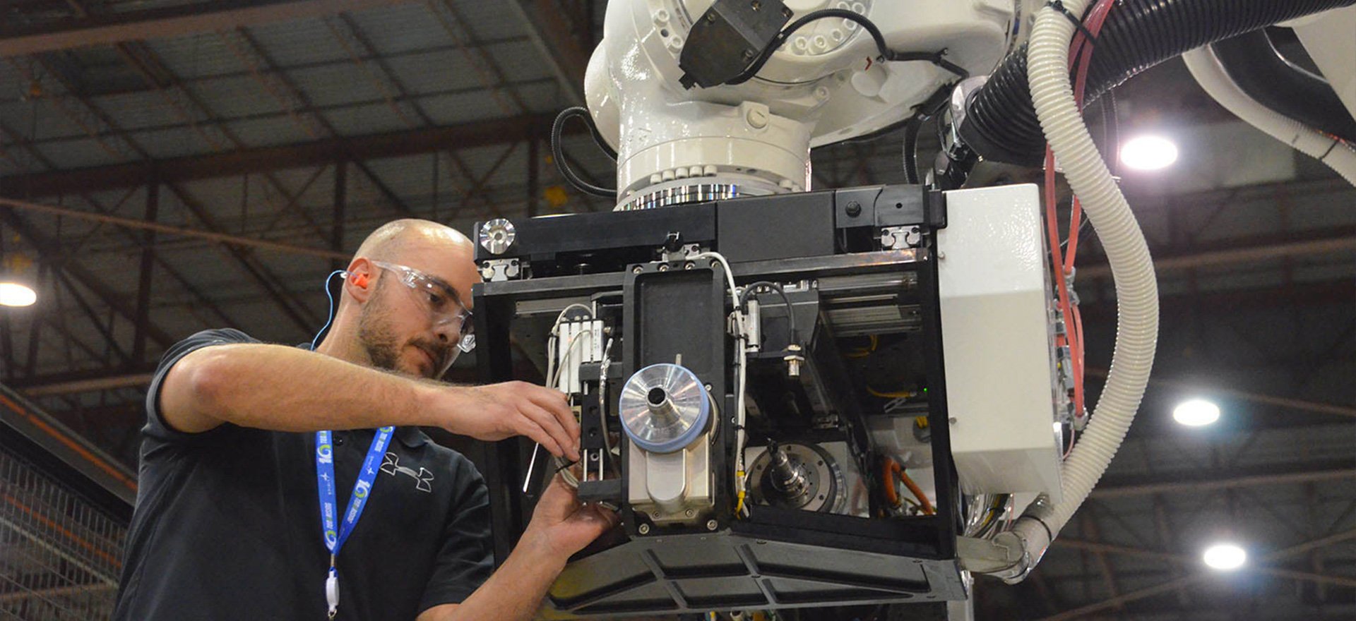 Aerospace worker performing work in a system